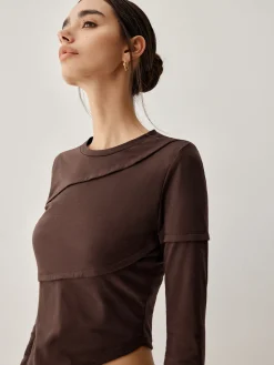 Asymmetric Hem Piping Long Sleeve Top