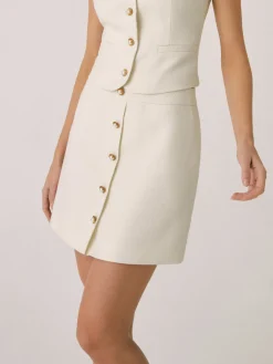 Elegant Pearl Buckle Mini Skirt