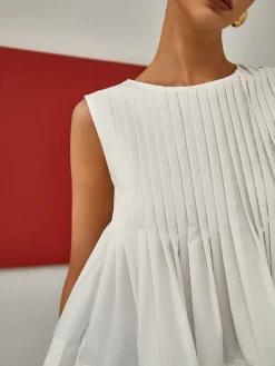 Pleated Peplum Sleeveless Blouse