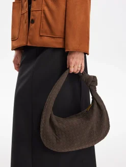 Rounded Woven Knotted Suede Bag